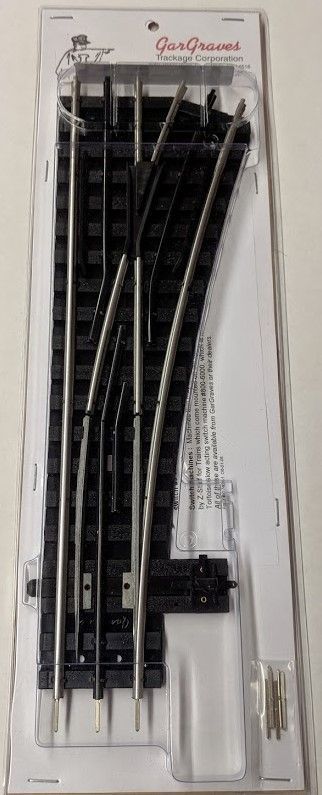 Clear plastic case holding several black-and-silver electronic probes or cables with a small accessory.