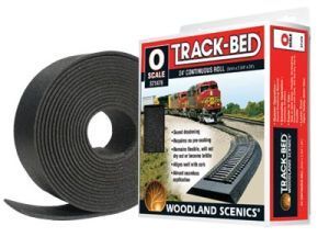 Black track bed roll next to Woodland Scenics Track-Bed HO scale product box