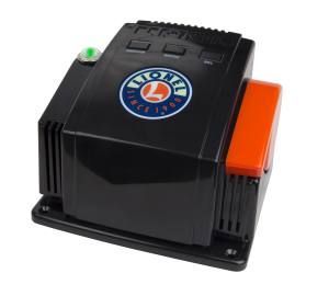 Black industrial control box with orange side panel and round logo on top, on a white background