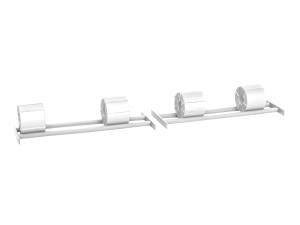 Clear plastic dispenser containers aligned on two metal bars against a white background