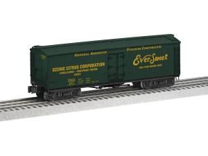 Green EverSleet freight boxcar on railroad track, shown in side view on a white background