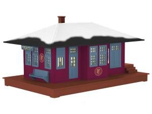 Small purple model house with white roof and dark trim on a wooden base