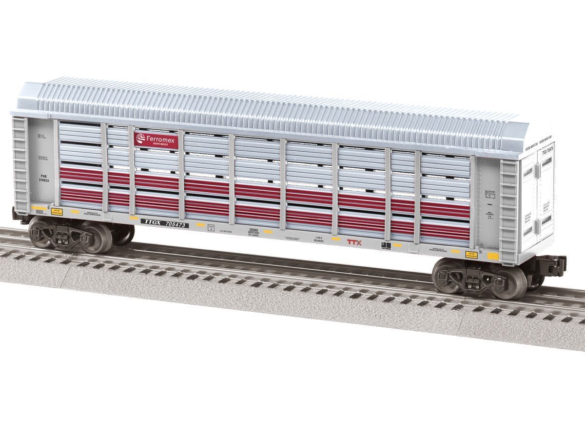 White livestock railcar model on train tracks with red and gray details