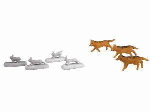 Two gray toy dogs and three brown toy dogs on a white background