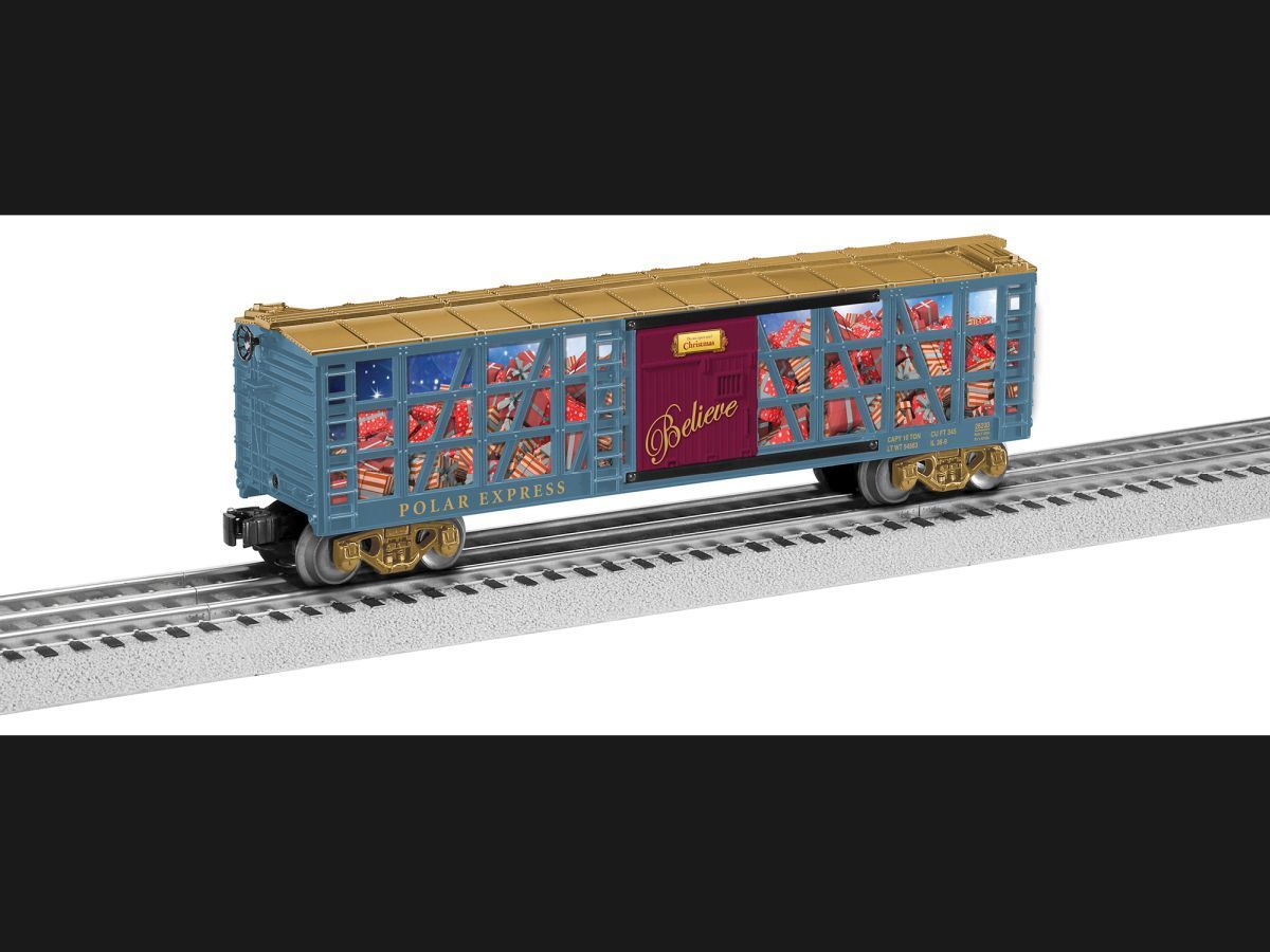 Blue toy cargo train car on a track with colorful side panels and a yellow roof