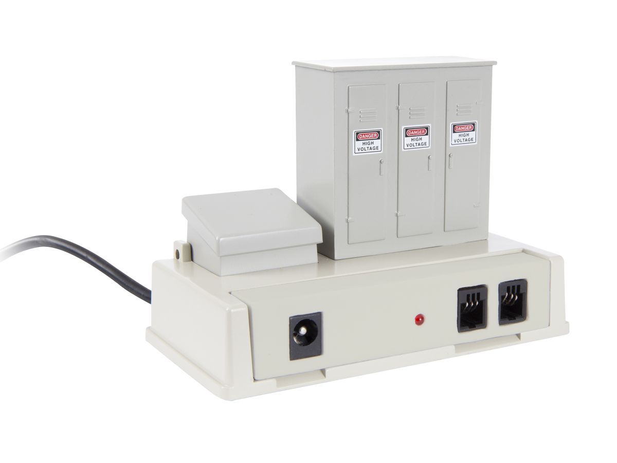 Electrical power strip with three outlets and a small gray switch box on a beige base, with a power cord attached