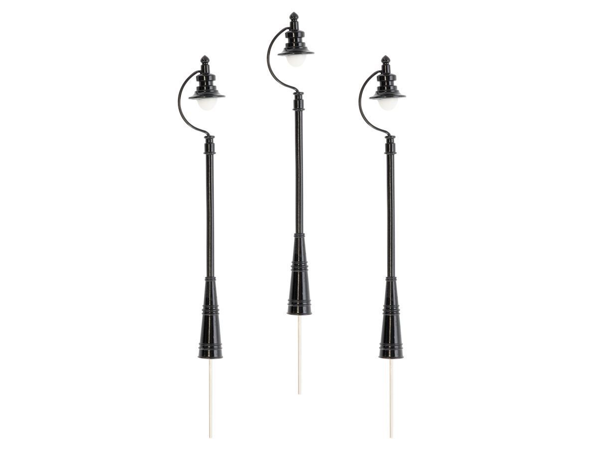 Three black decorative street lamps with curved arms and white light poles on a white background