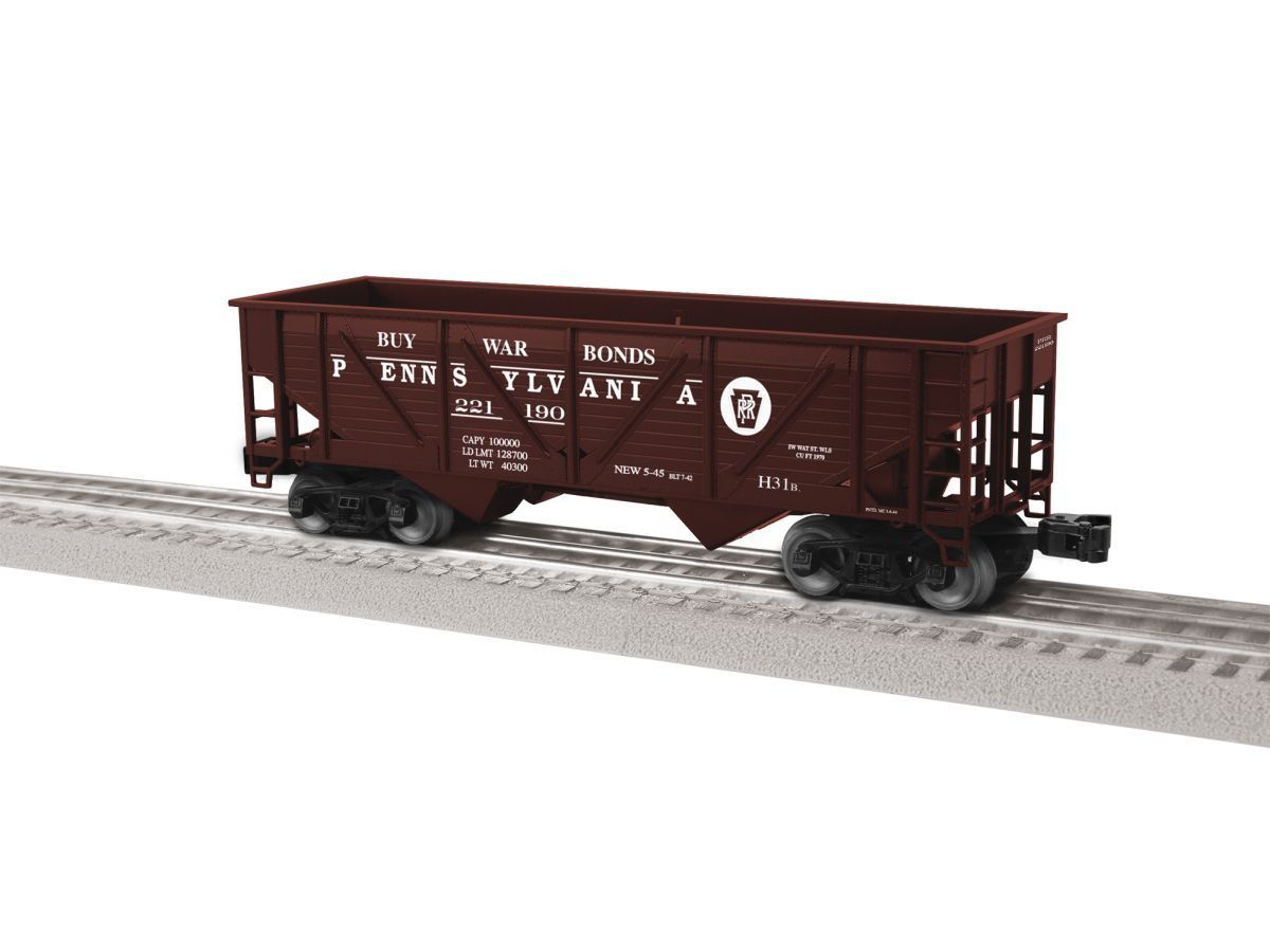Maroon freight boxcar on model railroad tracks against a white background