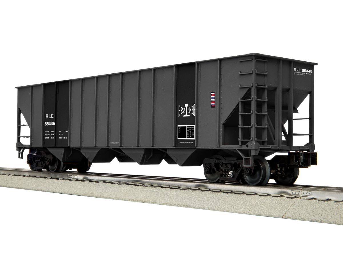Black freight hopper railcar on tracks, shown in side view against a white background