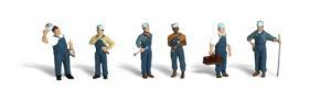 Six musicians standing with instruments on a white background