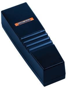 Black rectangular foot-operated switch with ribbed top and small orange label