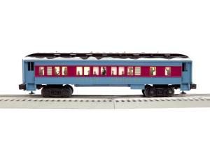 Red and blue model train car on a track against a white background