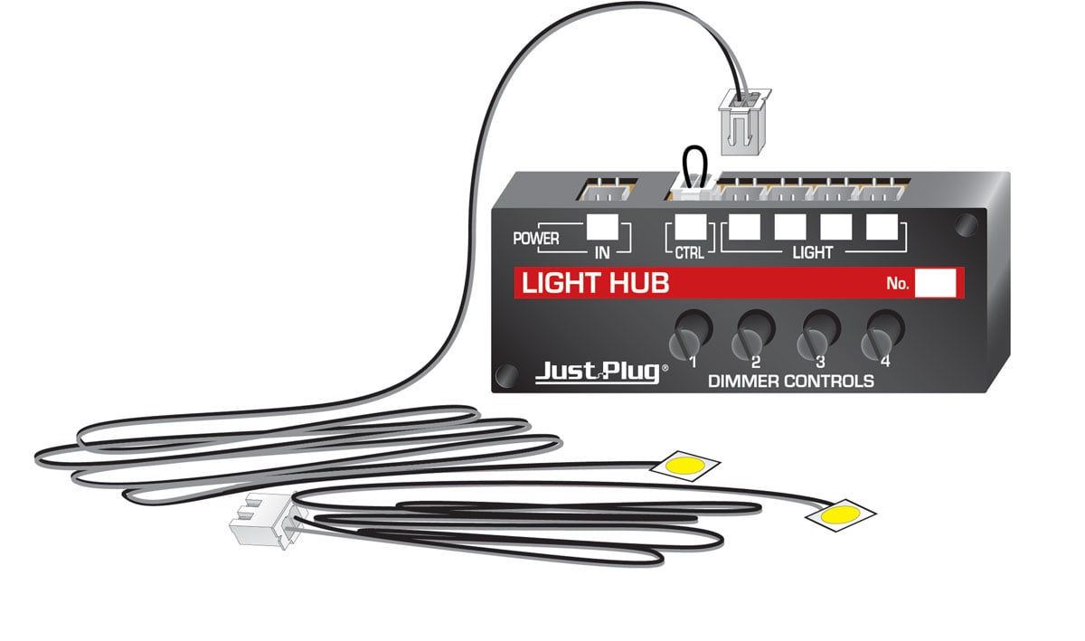 Black lighting hub with connected cables and plugs on a white background