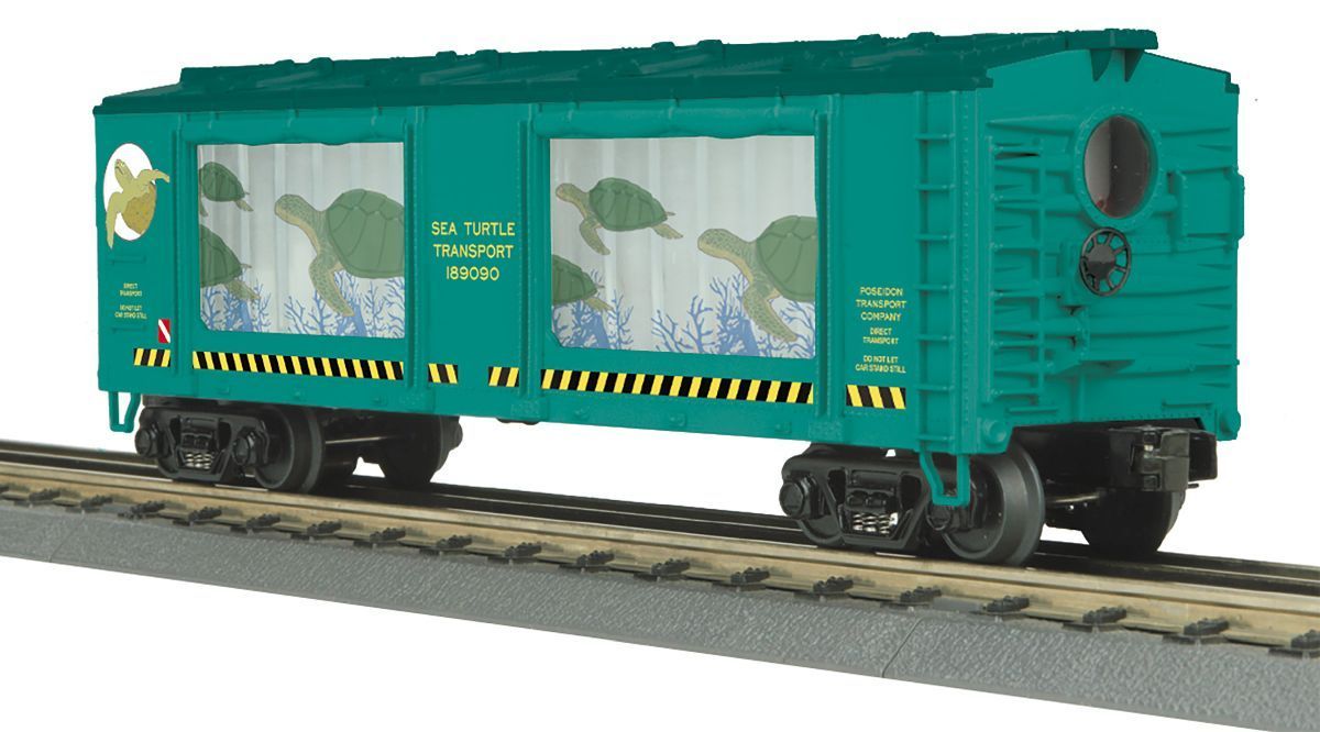 Turquoise boxcar on train tracks with cloudy sky graphics and yellow hazard stripes