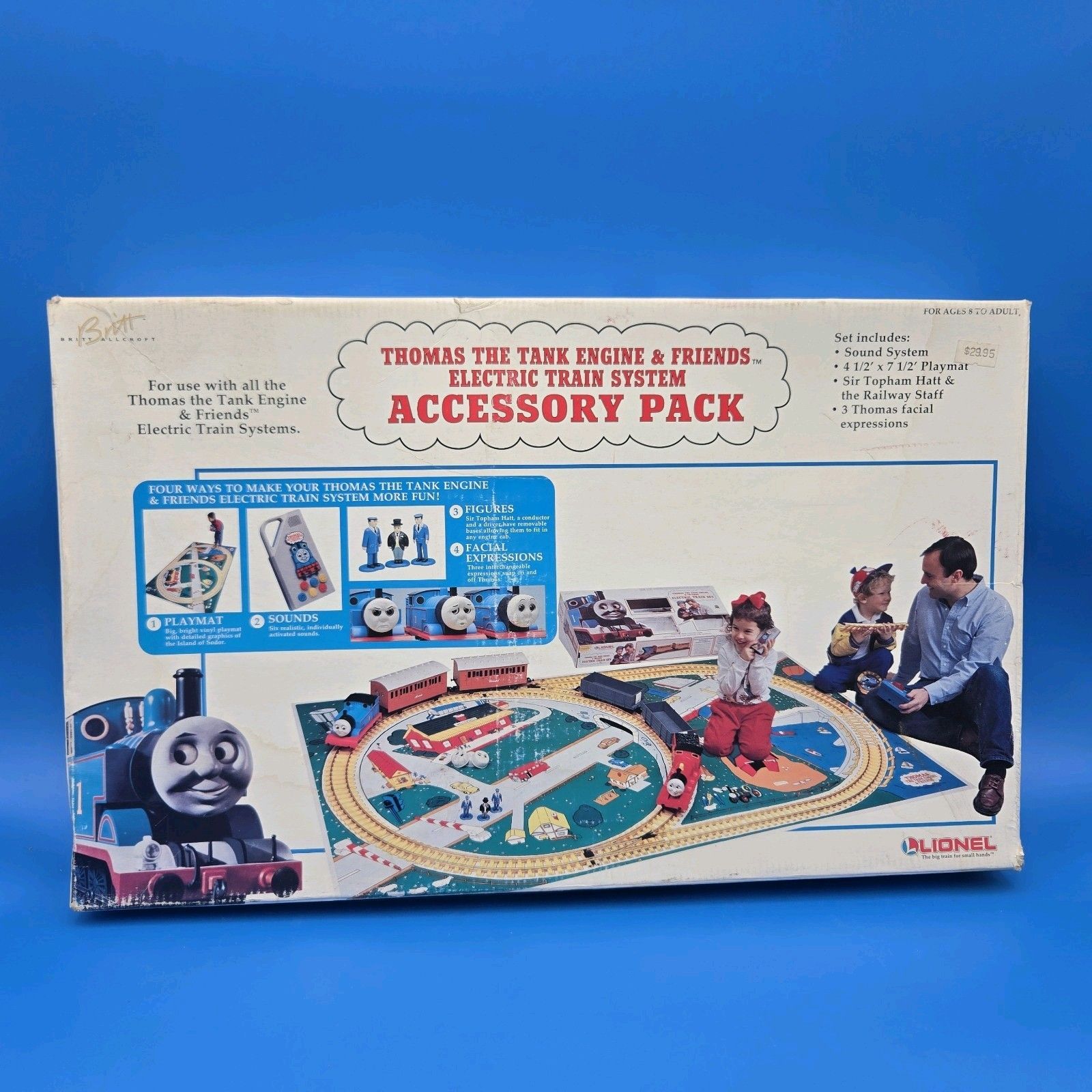 Vintage Thomas the Tank Engine “Accessory Pack” toy box with a track set and children playing in the illustration