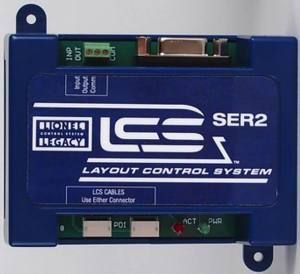 Blue SER2 layout control system module with ports and connectors, labeled “Laser Entry.”
