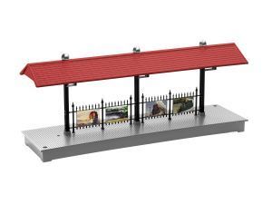 Covered train platform with red roof and black fence posts on a gray base