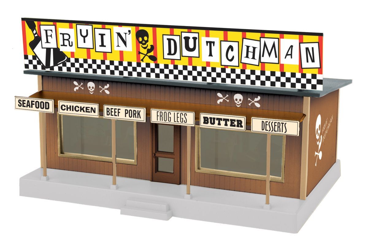 Fry’n Dutchman food stand with checkered awning, menu signs, and wooden service windows