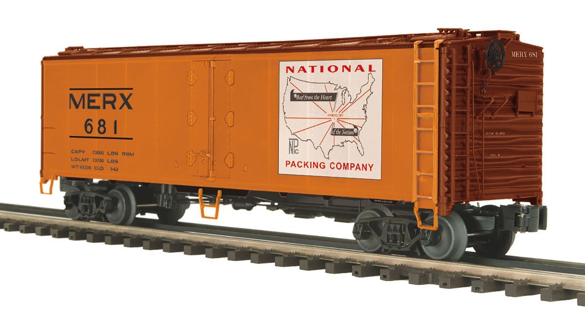 Orange model boxcar on railroad track with black wheels and side labels