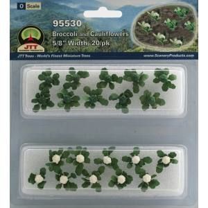 Toy model package of broccoli and cauliflower plants in two clear trays on a blue card.