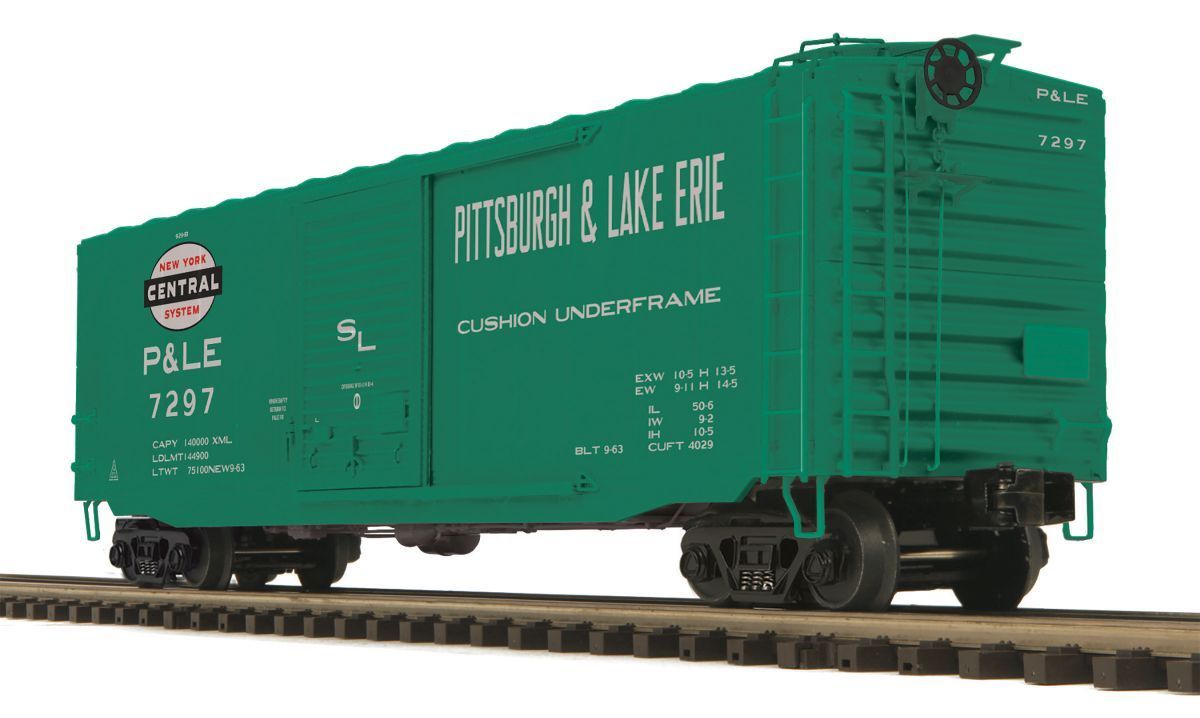 Green Pittsburgh & Lake Erie freight boxcar on railroad tracks