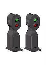 Two black traffic signal poles with red and green lights on each, side by side