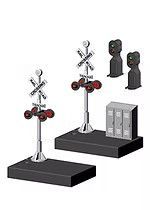 Two miniature signaling figures on bases, with red lights and small gray block structures in a dark display.