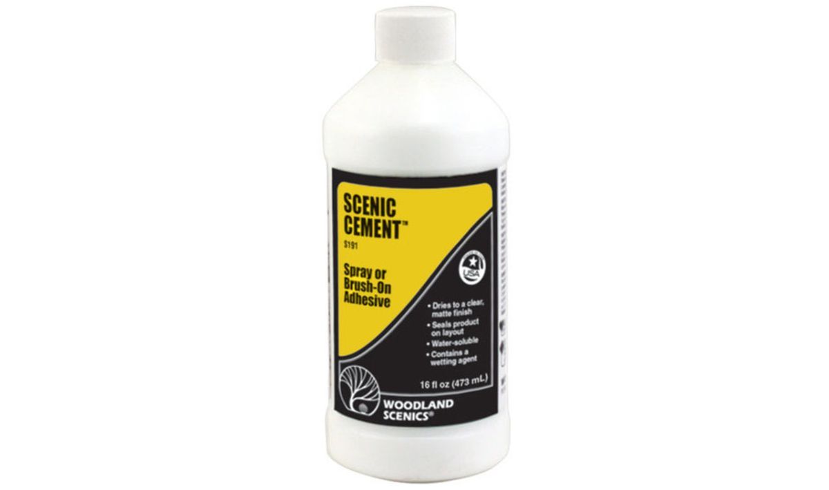 White bottle of Sika Boom Cement adhesive with yellow and black label on a white background