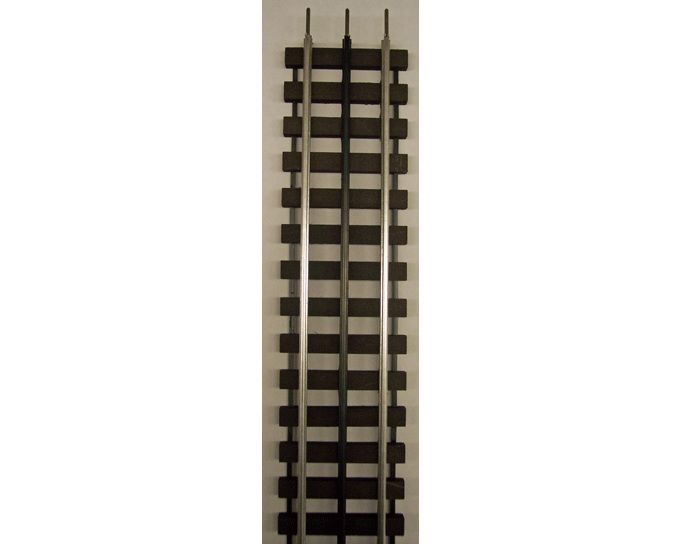 Close-up of a single railroad track with brown ties and steel rails on a light background