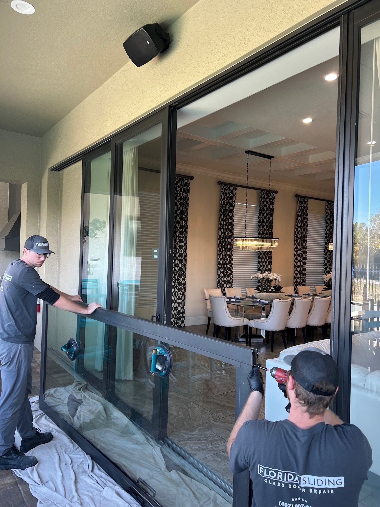 Professional sliding glass door repair in Orlando home with new track and rollers