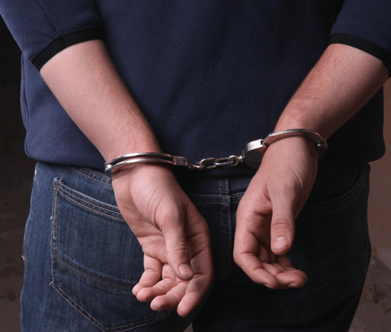 Man with Handcuffs — Mansfield, OH — John S. Dilts, Attorney