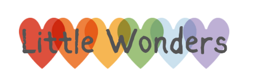 A series of overlapping hearts in rainbow order with handwritten-style text reading