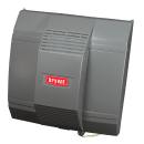 Gray outdoor equipment enclosure with a red label on the front
