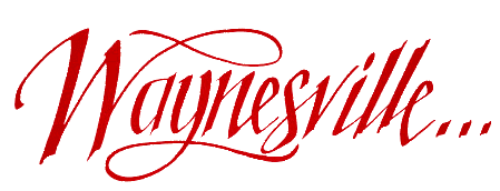Red script logo reading “Waynesville...” on a white background
