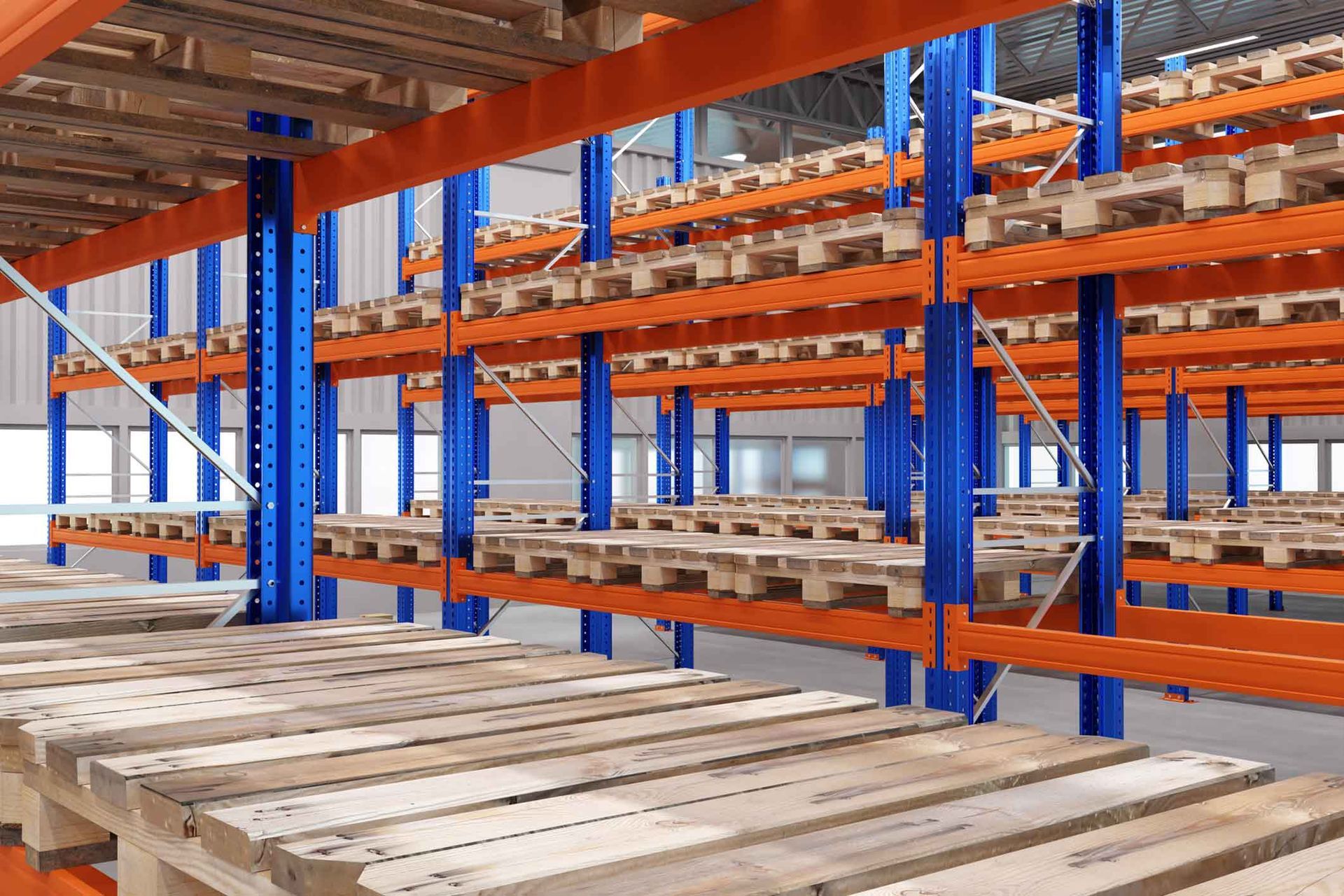 A warehouse filled with lots of wooden pallets and shelves.