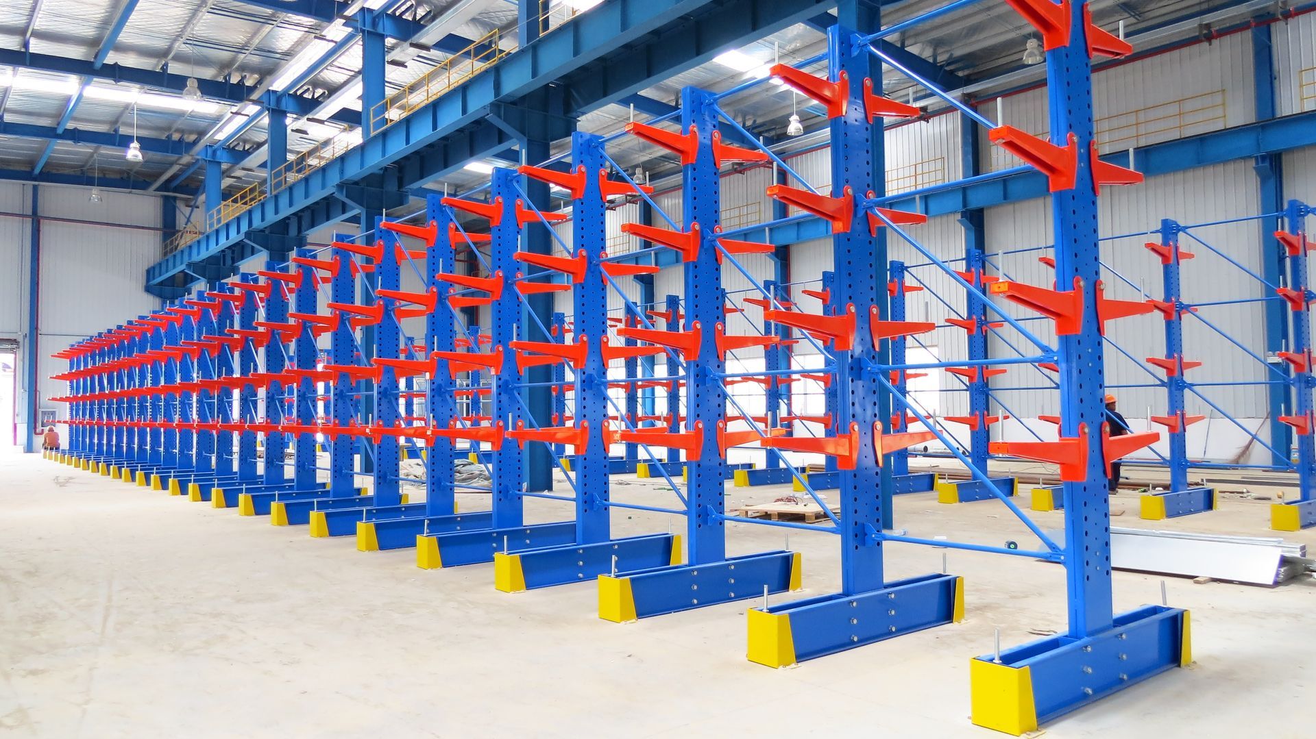 A warehouse filled with lots of aluminum tubes