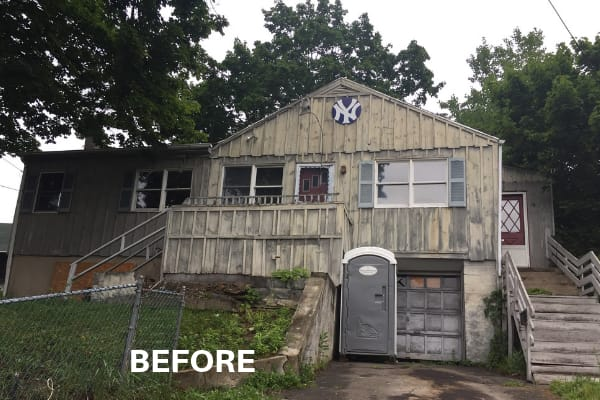 A dated, weathered roof before