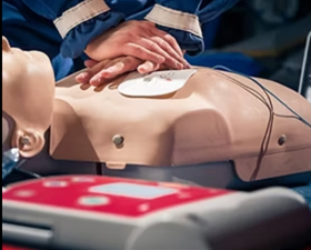 AED and early defibrillation training — AHA BLS classes, Cardiac Edge Bithlo, FL AED training during an AHA BLS certification class — early defibrillation with chest compressions, Cardiac Edge Bithlo, FL
