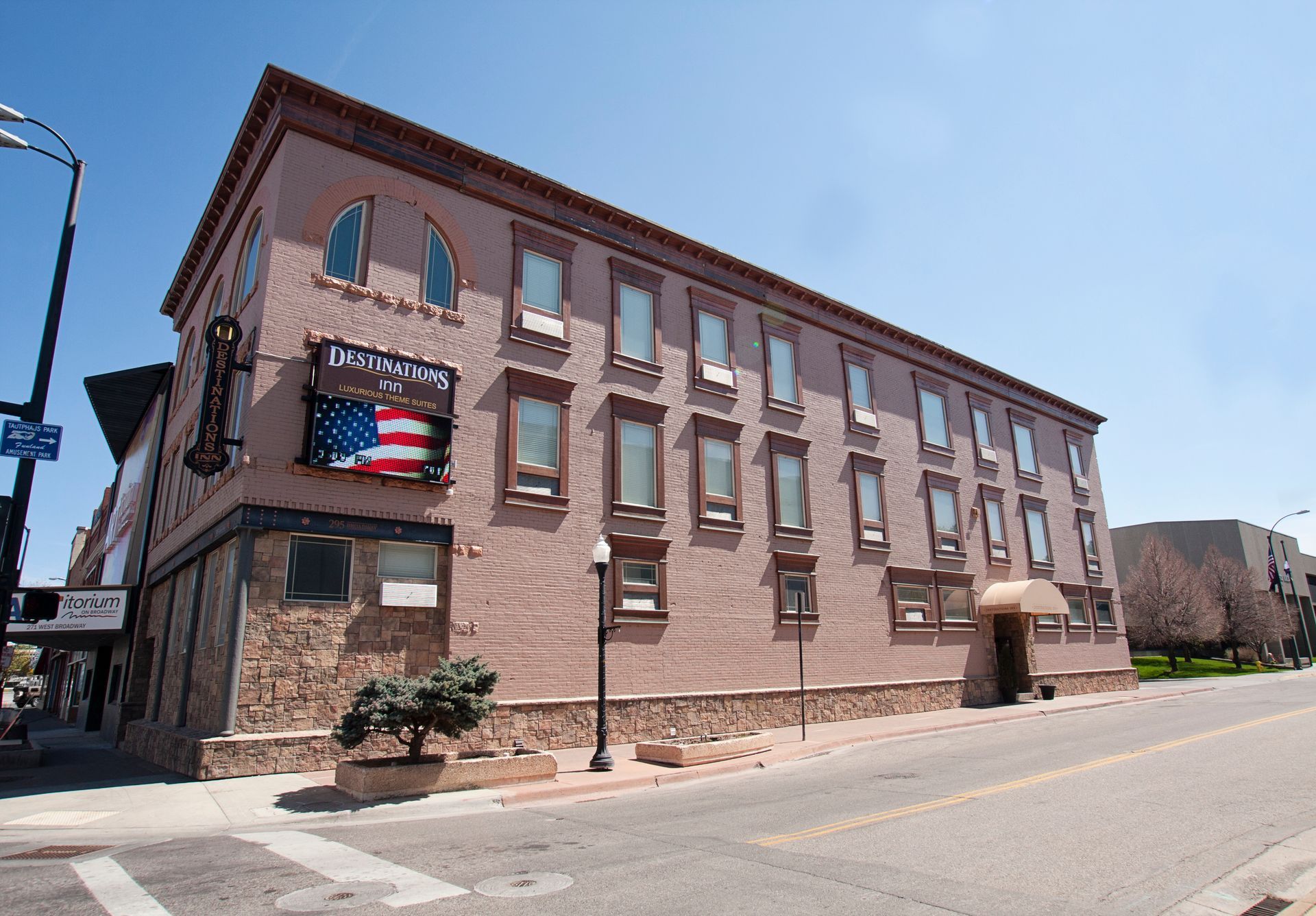 A large building with an american flag on the side of it