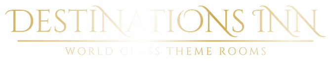 The logo for destinations inn is a world class theme suites hotel.
