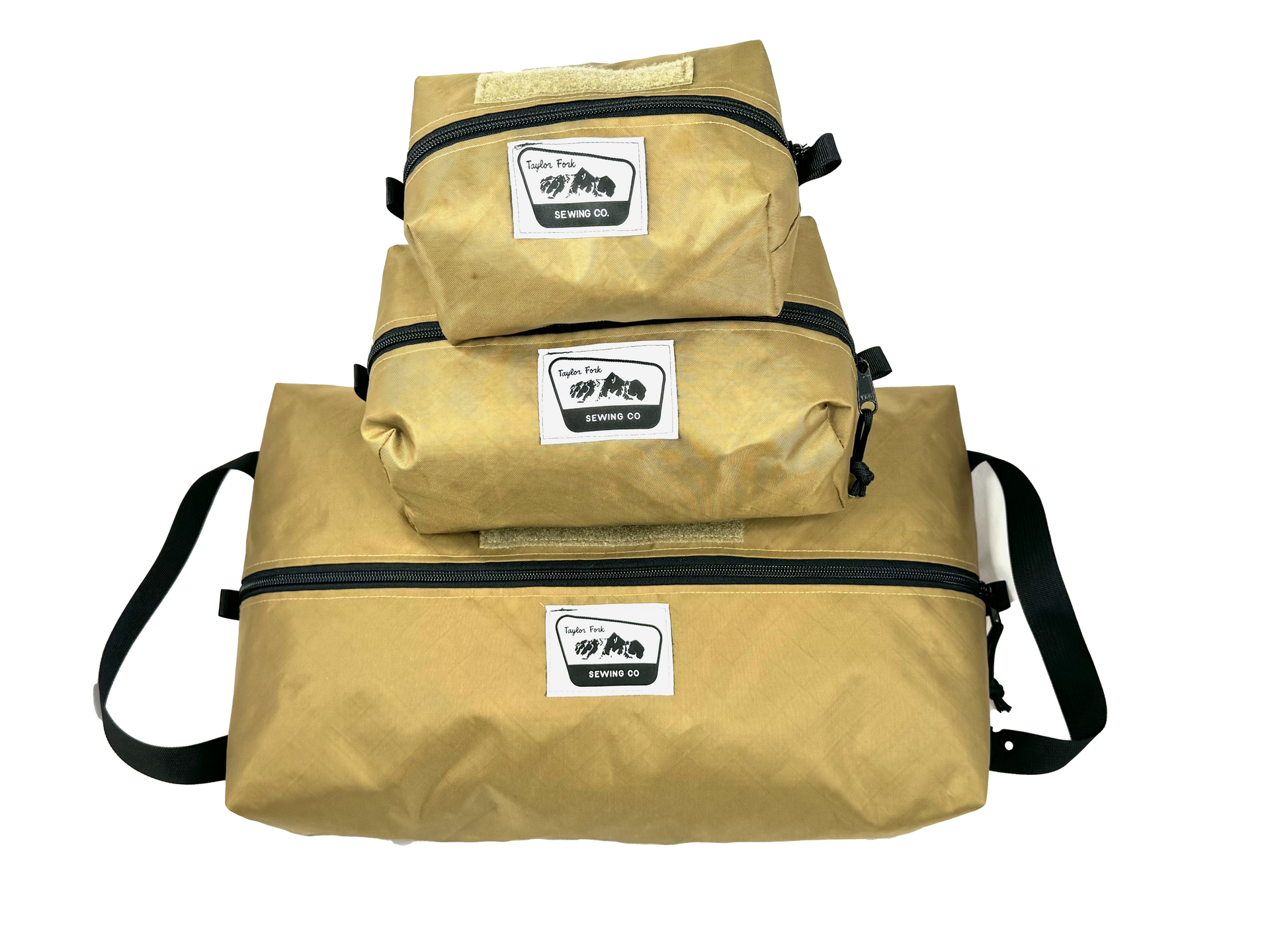 Three bags are stacked on top of each other on a white background.