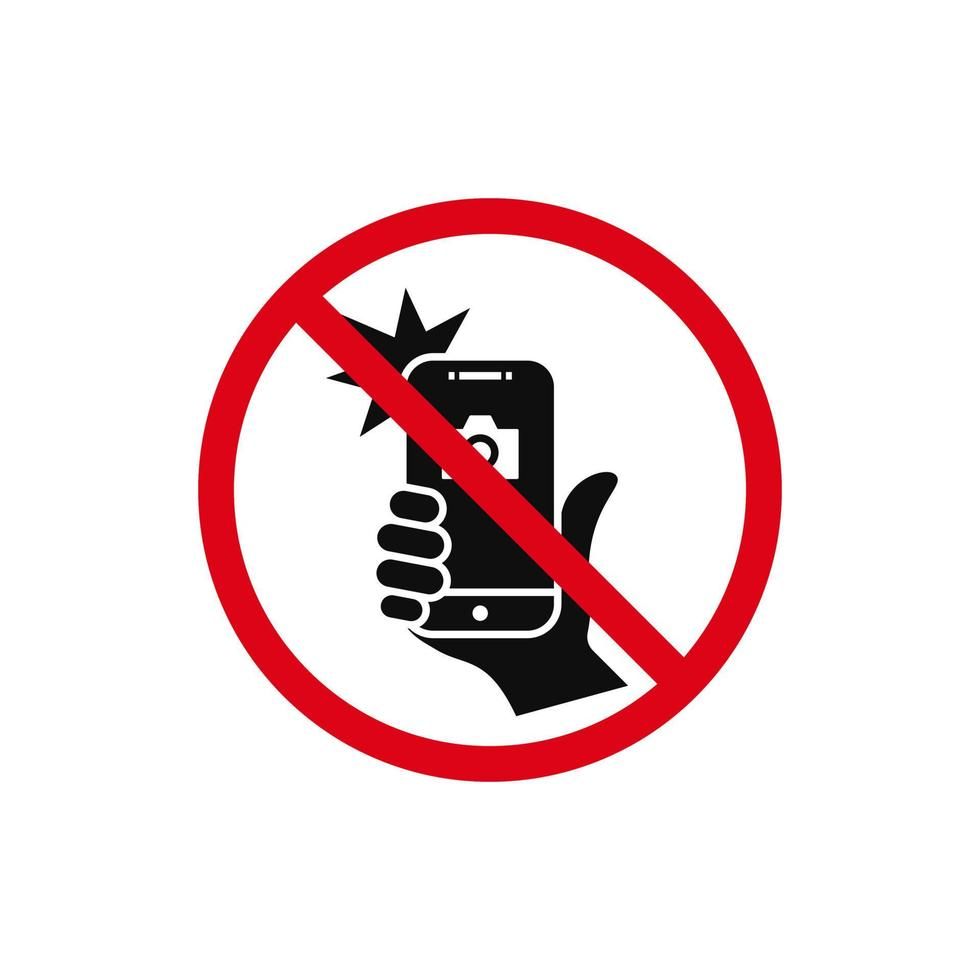 Red no-phone symbol over a hand holding a smartphone, indicating no smartphone use.