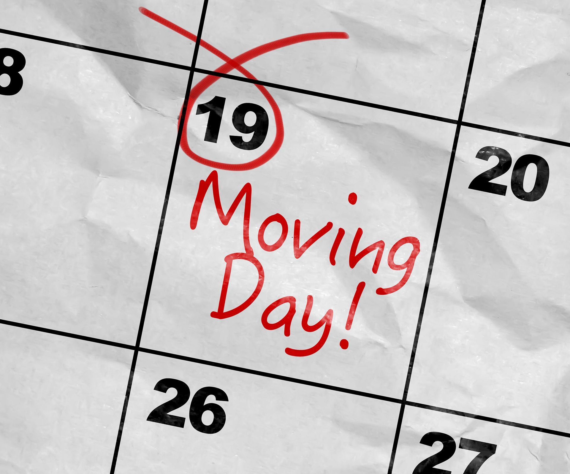 A calendar with moving day circled