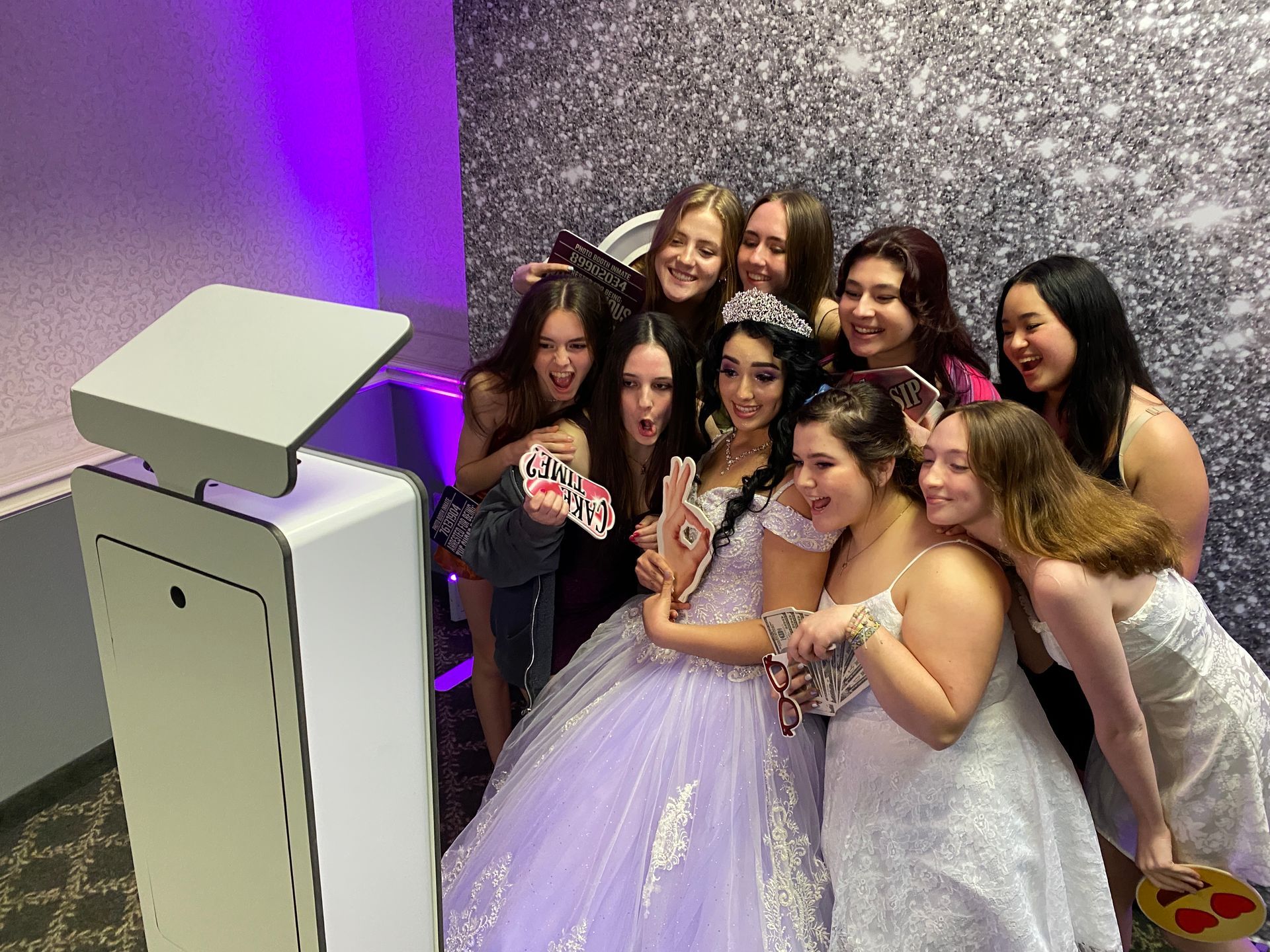 Sweet 16 guests posing at an Armani Entertainment party