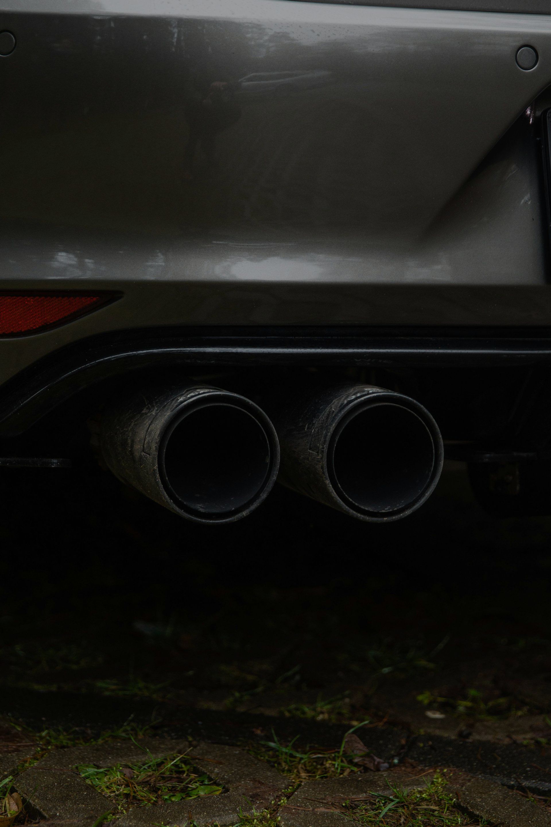 A close up of the exhaust pipes of a car.