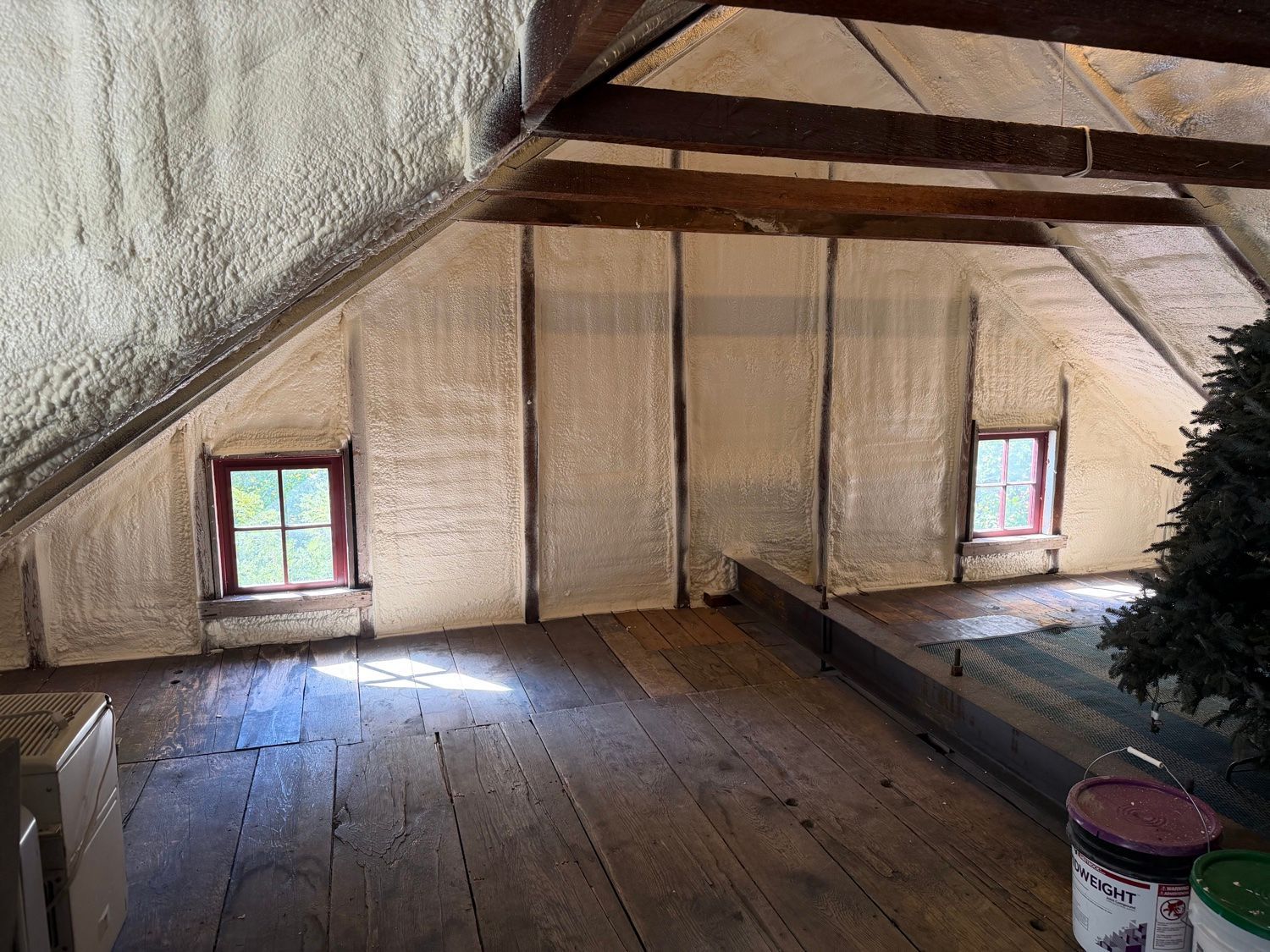 Old farmhouse attic with open cell spray foam on the walls and roof, Sunrise Valley Spray Foam