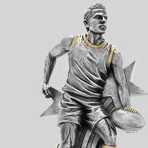 Sketch of a basketball player dribbling a ball, in gray with yellow accents on a light background