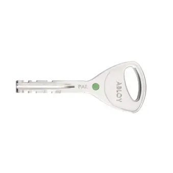 Silver key with green dot and “ABLOY” engraved on the head, isolated on white background