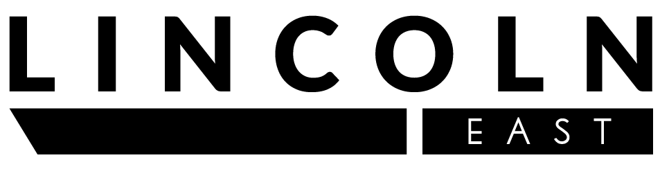 A black and white logo for lincoln east