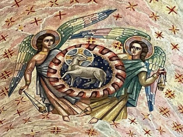 Mosaic of two winged angels beside a circular medallion with a lamb, set against a starry background